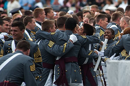 Cadets of the United States Military Academy celebrate at the completion of their graduation and commissioning ceremony