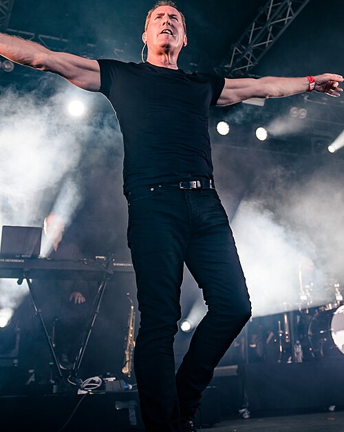 McCluskey performing with OMD in 2018