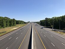 The northbound Garden State Parkway in Egg Harbor Township 2021-05-27 09 10 21 View north along New Jersey State Route 444 (Garden State Parkway) from the overpass for the ramps from Atlantic County Route 563 (Tilton Road) in Egg Harbor Township, Atlantic County, New Jersey.jpg