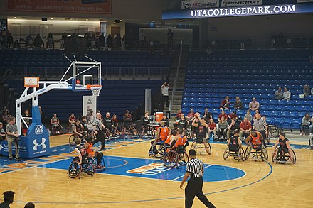 Men's wheelchair basketball playing against the UT Arlington Movin' Mavs in the 2022 National Intercollegiate Wheelchair Basketball Tournament Men's Championship