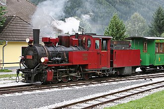 Club 760 699.01 in red tourist railway livery on the Taurach Railway in Mauterndorf 69901 Mauterndorf.jpg