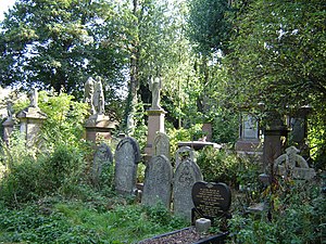 Nature takes its course, as interments are rare. The grave in the foreground, dating from 1992, is an exception (September 2005). Abney park cemetery 1.jpg