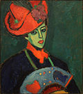 Sjokko med raud hatt, 1909