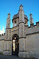 The ornamental railinged gate of All Souls College on the east side of Catte Street.