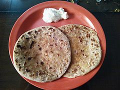 Punjabi Aloo Paratha served with Butter, from India