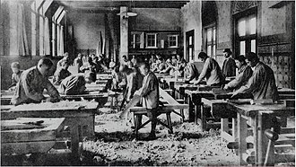 Boys at the ambachtsschool on the Kamperstraat in the carpentry class, ca. 1900 Ambachtsschool kamperstraat timmerwinkel 1900.jpg