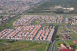 An aerial view of a city block in Lentegeur. A section of the Mitchells Plain Hospital can be seen in the far right corner of the photograph.