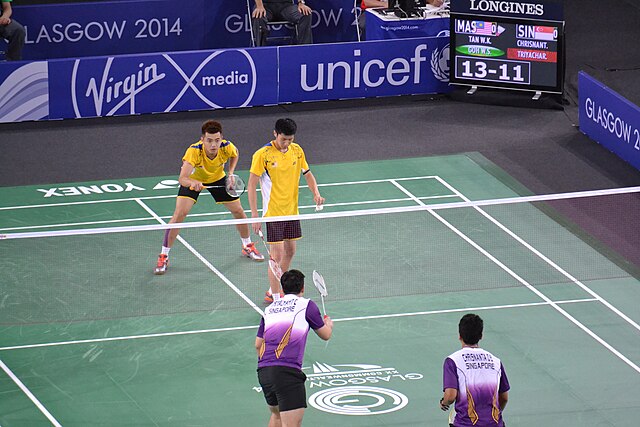 Triyachart and Danny Bawa Chrisnanta against Malaysian pair during the final of 2014 Commonwealth Games