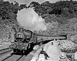 Ex-GWR 'Castle' 4-6-0 No. 5079 Lysander heads the down Torbay Express out of Parson's Tunnel at Dawlish Dawlish Parson's Tunnel geograph-2444582-by-Ben-Brooksbank.jpg