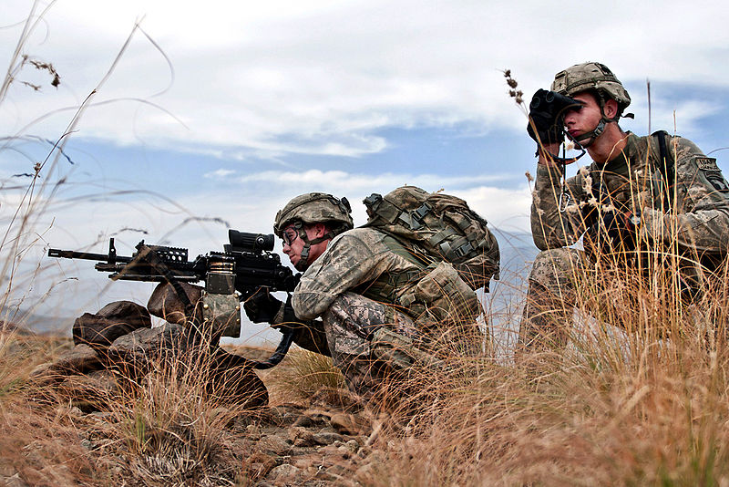 File:Defense.gov News Photo 101104-A-7125B-053 - U.S. Army Spc. Joshua D. Heinbuch left and Spc. James M. Piccolo right secure the area after finding an improvised explosive device on a road in.jpg