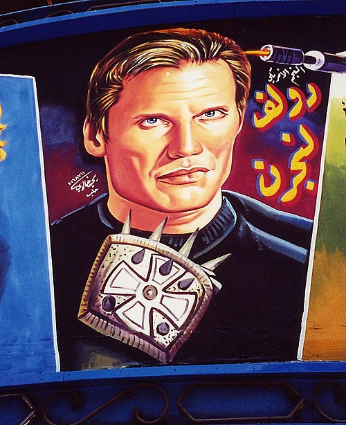 A wall mural of Lundgren outside a cinema in Damascus, Syria