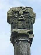 Arms of the Earl of Kincardine on the cross at Kincardine, Fife. The creation of the earldom in 1647 points to the cross being erected some time after that date. Earl of Kincardine arms, mercat cross, Kincardine.JPG