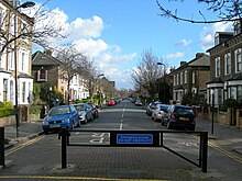 A pre-COVID-19 modal filter on Finsbury Park Road in Hackney. The barrier arrangement allows cyclists and emergency vehicles to pass through but excludes general motor traffic. Finsbury Park Road, N4 - geograph.org.uk - 735445.jpg