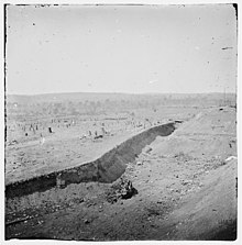 Earthworks in Fort Sanders showing The Northwest bastion of Fort Snaders,viewed from the Southwest bastion Fort-sanders-knoxville-1864-tn1.jpg