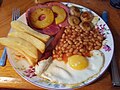Gammon with pineapple, fried egg, baked beans, mushrooms & chips with a chipolata sausage (35595090885).jpg