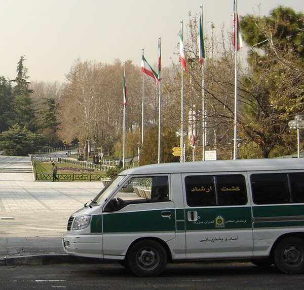 A Guidance Patrol van parked in front of Mellat Park, Tehran