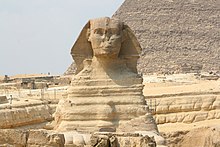 Erosion on the front body of the Sphinx and the enclosure behind. Weathering on the head and neck was repaired in the 1920s. Great Sphinx of Giza, Giza, Egypt6.jpg