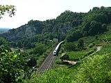 3. KW Ein ICE auf der Strecke der badischen Hauptbahn vor dem Isteiner Klotz (2006).