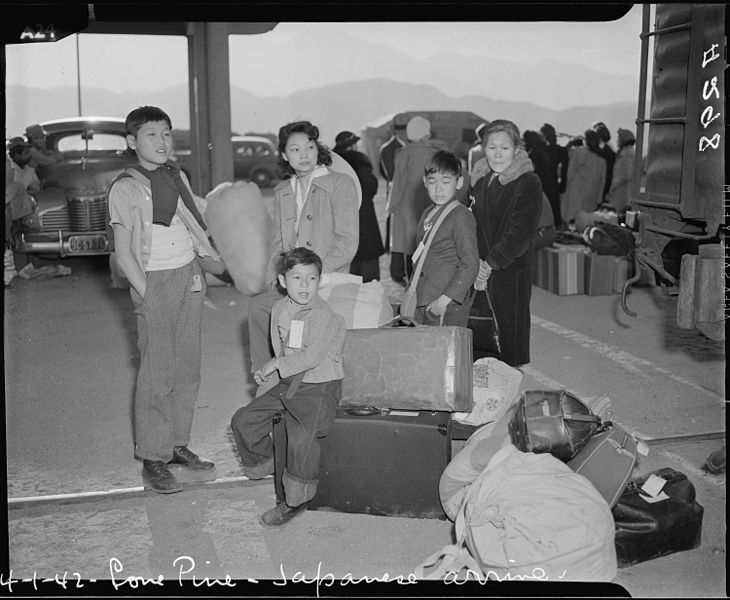 File:Lone Pine, California. Evacuees of Japanese ancestry arrive here by train and await buses for Manza . . . - NARA - 536237.jpg