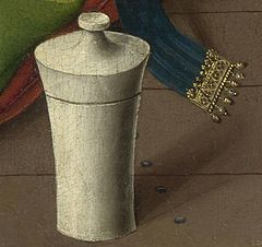 Detail showing the jar and row of nails on the timber floor at the lower right corner of the panel. Note the attention paid to the gilded clasp and fall of the shadow. M Reading Detail3.jpg