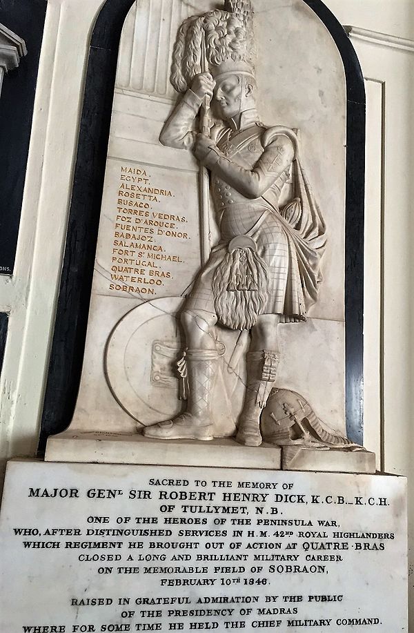 Memorial to Sir Robert Henry Dick at the St. George's Cathedral, Madras, India, depicting a 42nd Highlander in full uniform resting against a pedestal