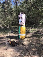 Mr Stringy painted as an emergency firefighter (Green - FFMVic and yellow - CFA) wearing a mask during Covid - 2020.