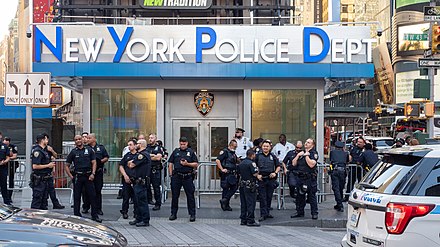 New York City Police Department officers outside a police station in Times Square, New York City in 2021
