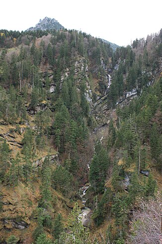 On the right the Gampfall which falls in several cascades.  Left in the background the corner head