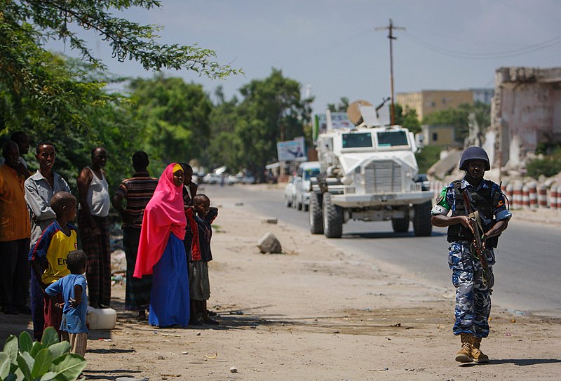 File:On foot patrol in Mogadishu with an AMISOM Formed Police Unit 04 (8171792000).jpg