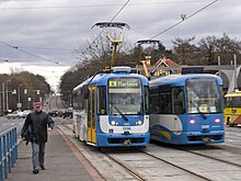 Ostrava trams in their traditional blue and white livery at the "Nova Ves vodarna" stop Ostrava, Nova Ves, vodarna, Varia LF2.jpg