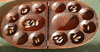 Oware An abstract strategy game among the Mancala family of board games (pit and pebble games) played worldwide with slight variations as to the layout of the game, number of players and strategy of play.