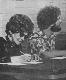 Woods (right) moderating a 1974 panel about sex in Hawaii state prisons Panelists Woods and Madden.png