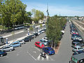 English: Parking of Moulins-sur-Allier railway station, view to the north from footbridge, Moulins side [8847] Français : Parking de la gare de Moulins-sur-Allier, vue vers le nord depuis la passerelle, côté Moulins [8847]