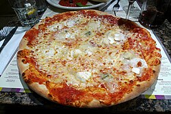 Pizza quattro formaggi at restaurant, Chalk Farm Road, London.jpg