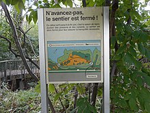 Cartel de advertencia publicado en francés en la parte francesa de San Martín