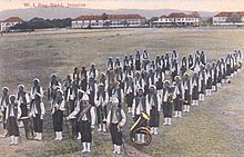 The band is the successor to the bands of the British-era West India Regiments, seen here in Jamaica in 1907. Regimental Band, Jamaica, 1907.jpg