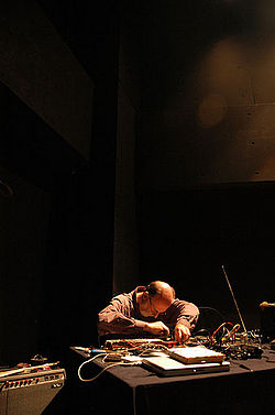 Keith Rowe performing solo at the AMPLIFY 2008 festival, Kid Ailack Art Hall, Tokyo
