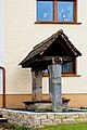 Brunnen mit Brunnenhaus