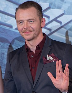 Star Trek actor and writer Simon Pegg giving a Vulcan salute in 2016.