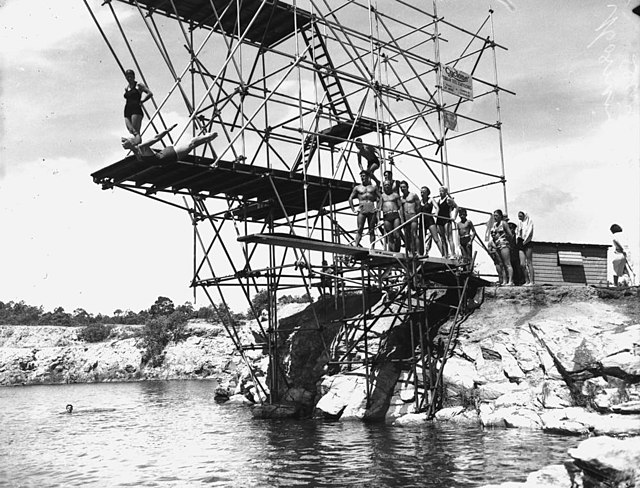 Woman diving into the Morningside Quarry, Brisbane, 1949