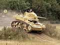 An M3A1 Stuart performing at the 2010 War and Peace Show in Kent, England.