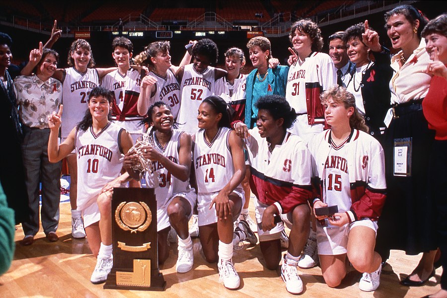 Stanford Cardinal team with 1990 National Championship Trophy