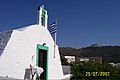 The church of Agia Paraskevi in Skala (front) and the Monastery of St. John the Divine