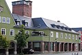 Town house with old savings bank and old municipal swimming pool (No. 1), residential building and fire department (No. 3)