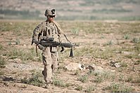 Infantryman patrolling with the M240B