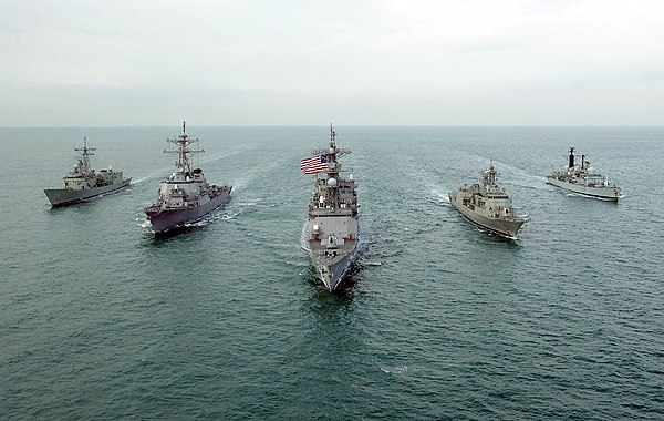 U.S. Navy, Royal Navy, and Royal Australian Navy destroyers and frigates on joint operations in the Persian Gulf.