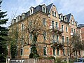 Tenement house with enclosure in open development