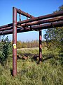 Abandoned pipings for radioactive waste leading, close-up