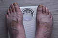 Weighting with bathroom scale.jpg