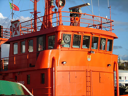 Wheelhouse on a tugboat, topped with a flying bridge